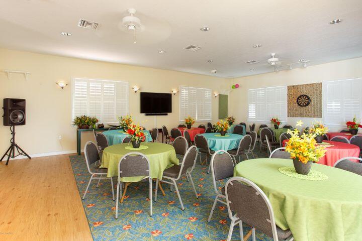 3750 Alamanda Key Drive Melbourne, FL 32901 - Photo 62 of 86 a view of a dining room with furniture