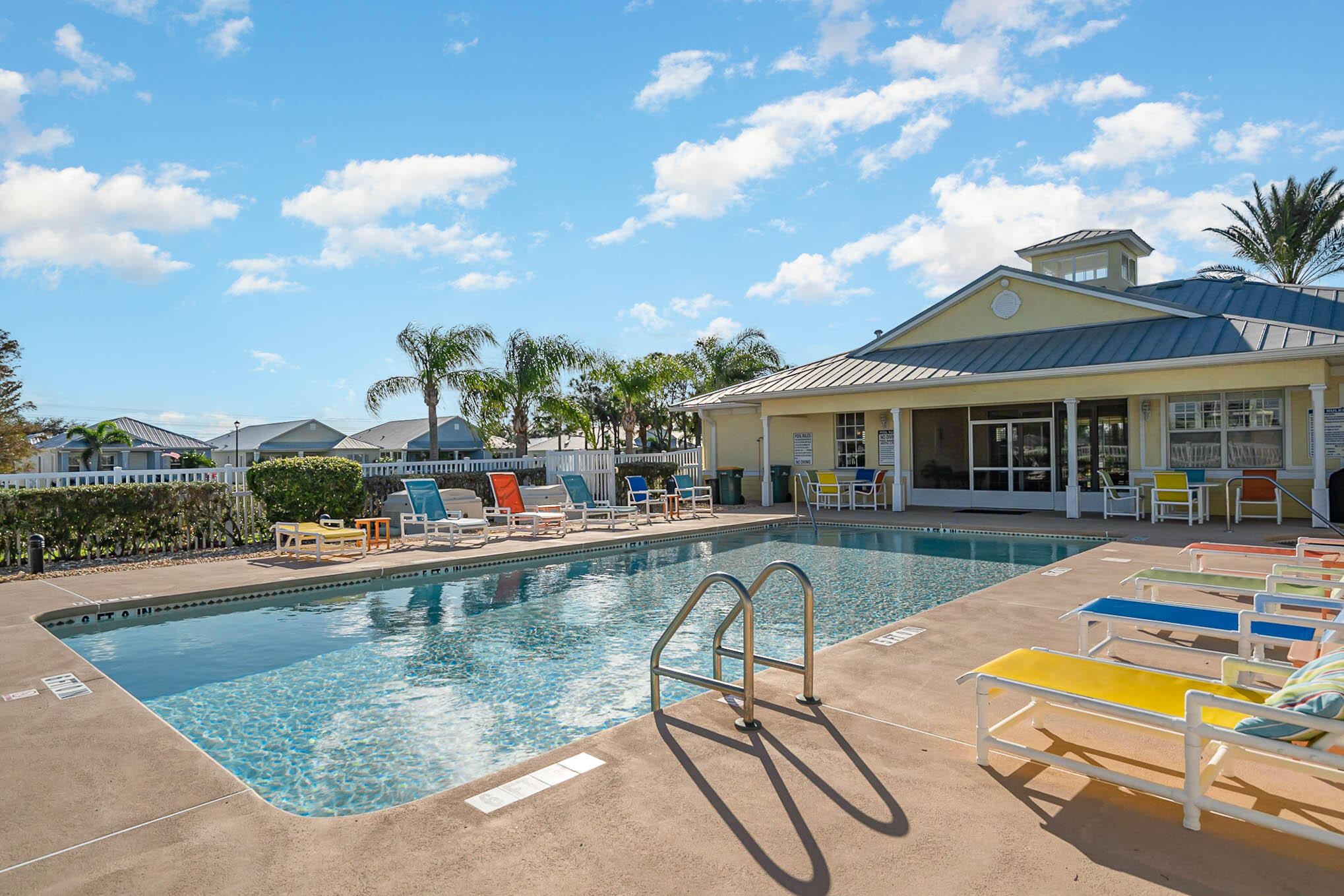 3750 Alamanda Key Drive Melbourne, FL 32901 - Photo 67 of 86 swimming pool view with a seating space and a garden view