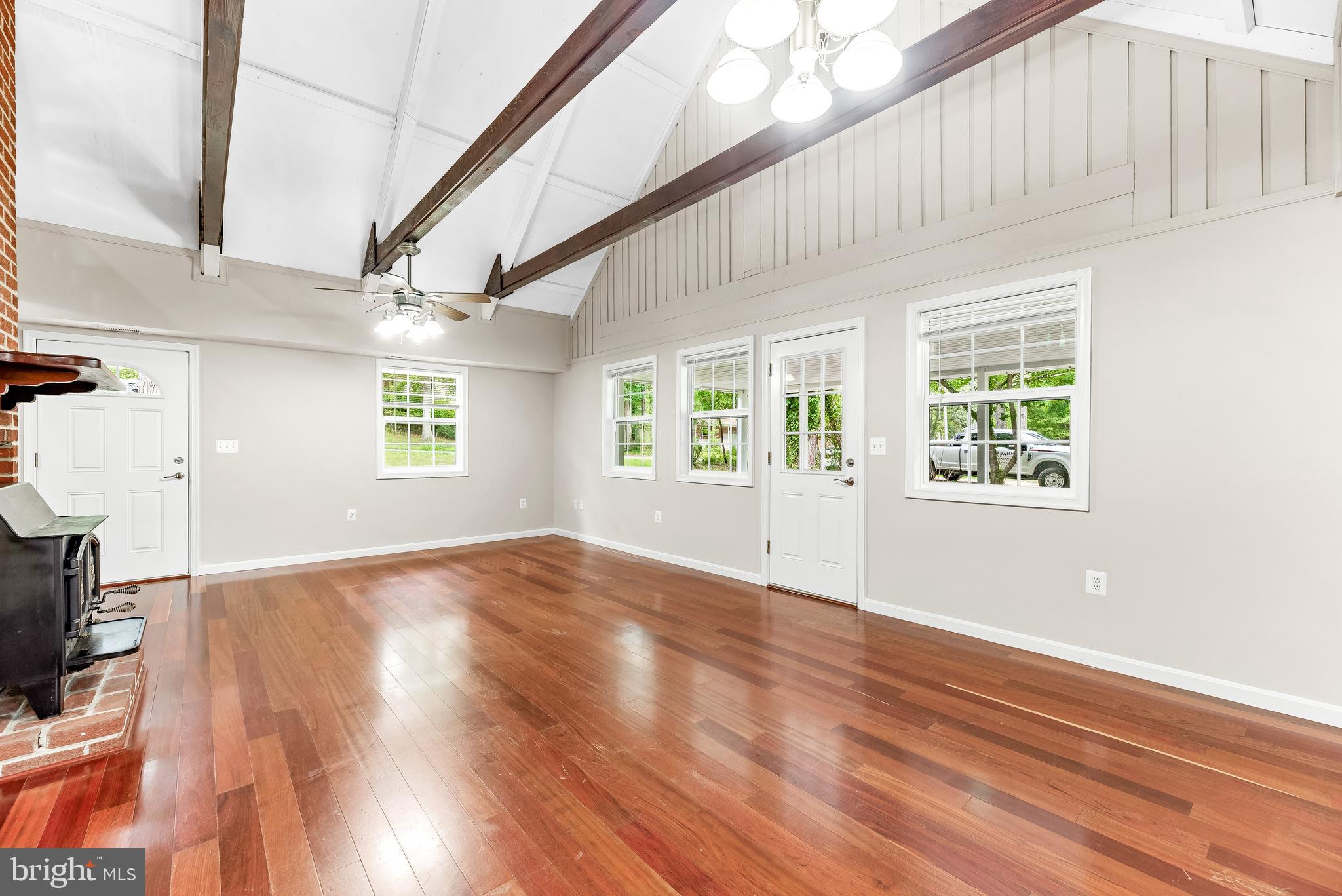 11432 Rawhide Road Lusby, MD 20657 - Photo 12 of 32 Great Room w/ Vaulted Ceilings & Custom Beams
