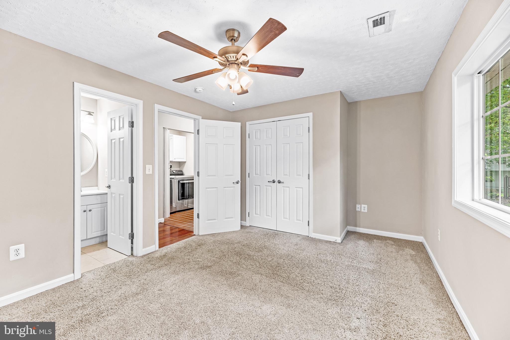 11432 Rawhide Road Lusby, MD 20657 - Photo 24 of 32 Primary Bedroom w/ Attached Bath