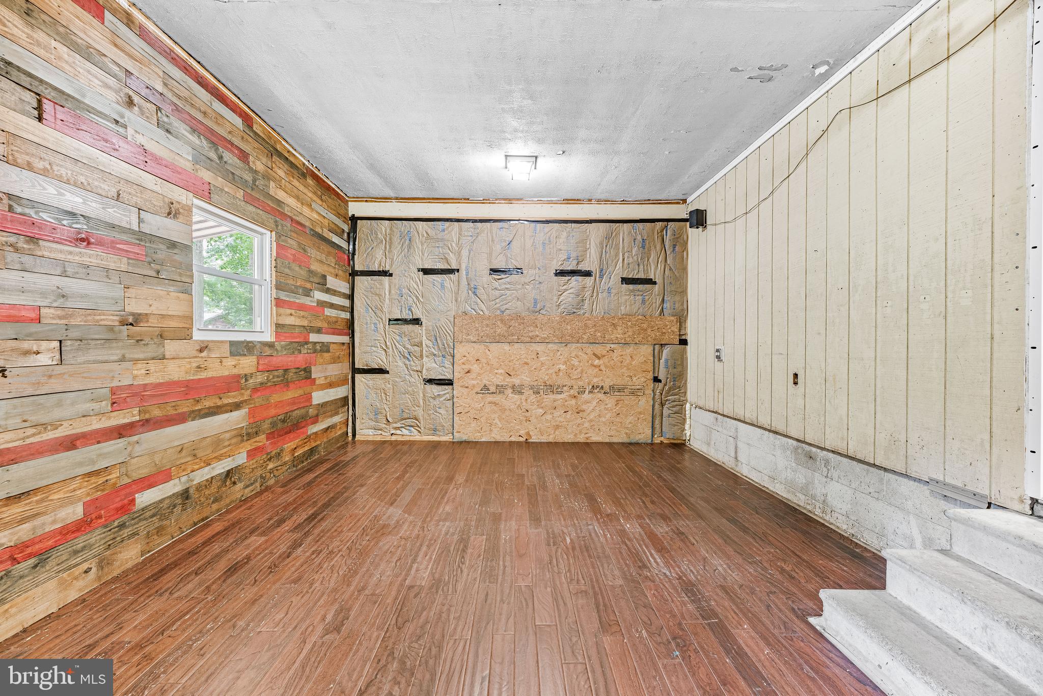11432 Rawhide Road Lusby, MD 20657 - Photo 31 of 32 Garage Area Previously a Bar / Man Cave
