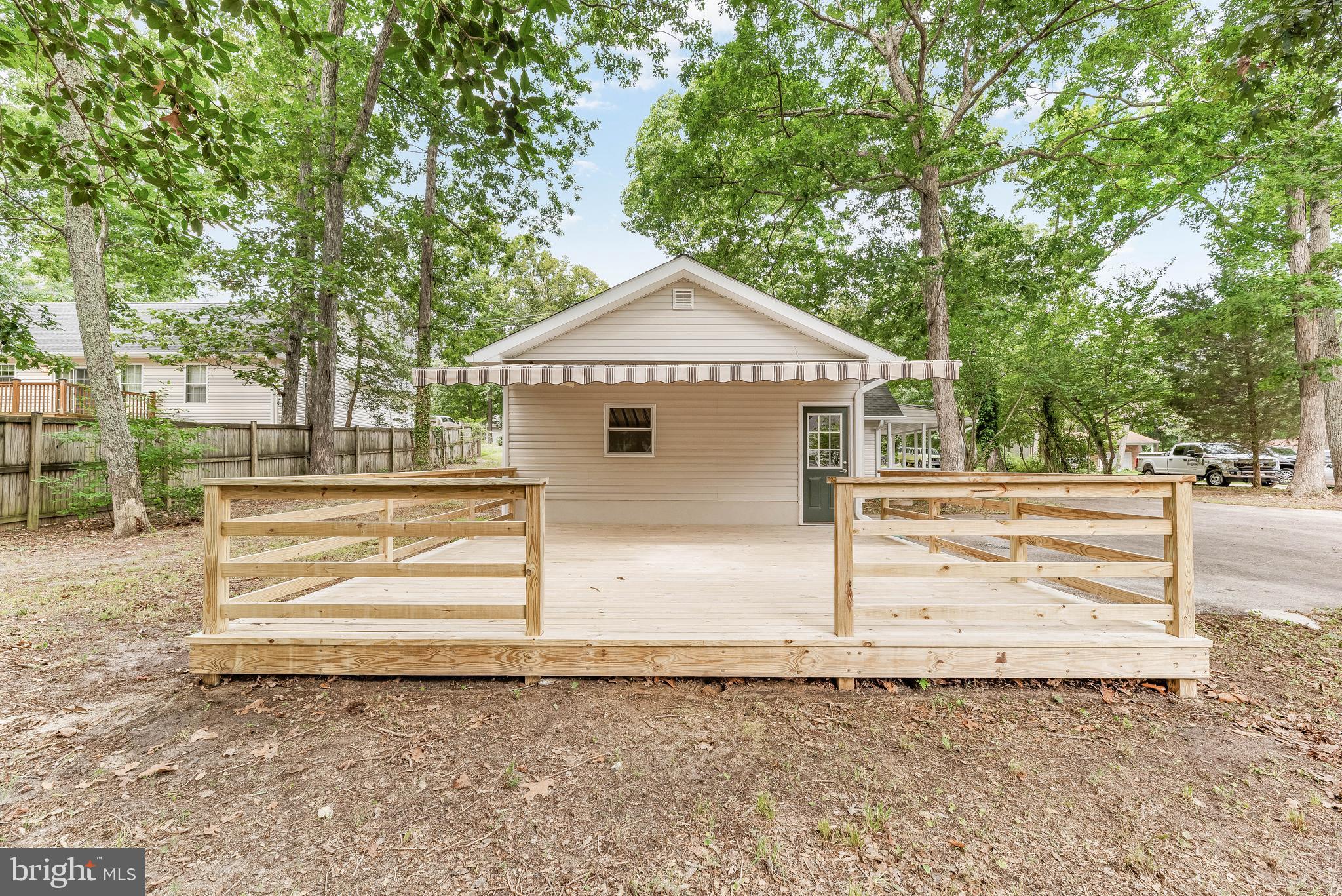11432 Rawhide Road Lusby, MD 20657 - Photo 10 of 32 Back Deck Located Off of the 1-Car Garage