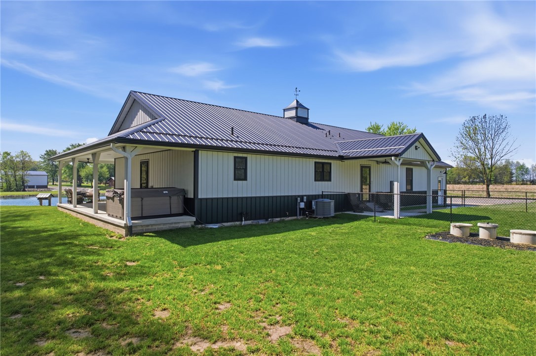 1602 Westboro Road Blanchester, OH 45107 - Photo 3 of 81 This captivating property features a vast yard and a welcoming covered patio, perfect for outdoor enjoyment.