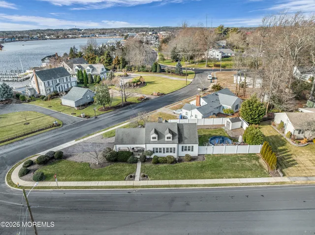 a view of a swimming pool and an outdoor seating