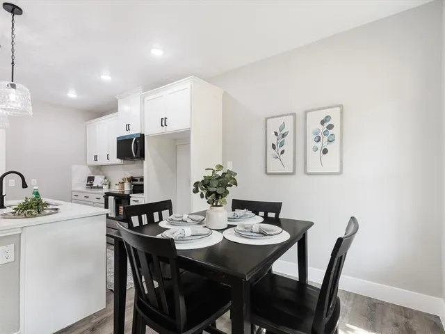 a view of a dining room with furniture