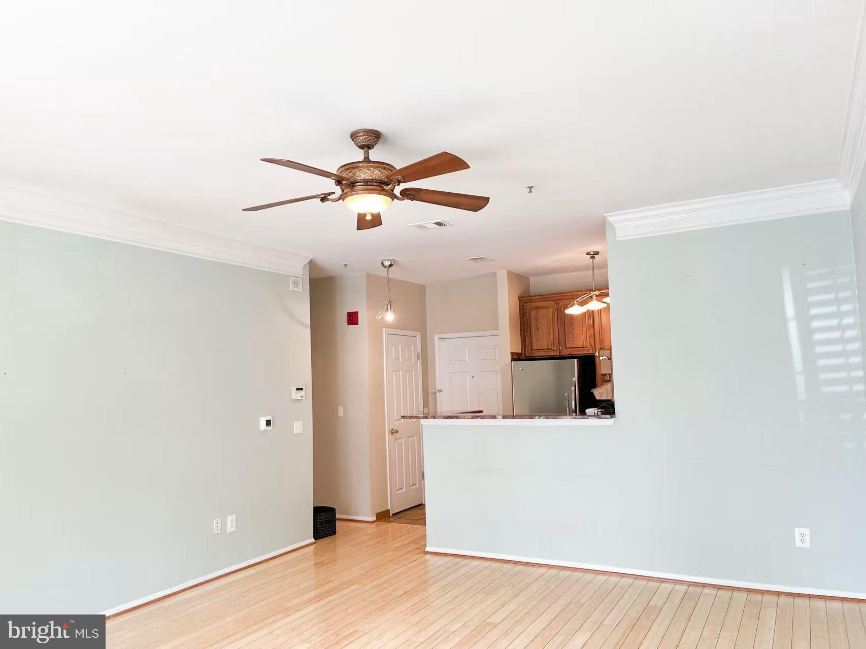1570 Spring Gate Dr., Unit 7109 McLean, VA 22102 - Photo 11 of 21 a view of a room with a ceiling fan