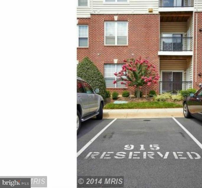 1570 Spring Gate Dr., Unit 7109 McLean, VA 22102 - Photo 20 of 21 a view of a street with a car parked front of it