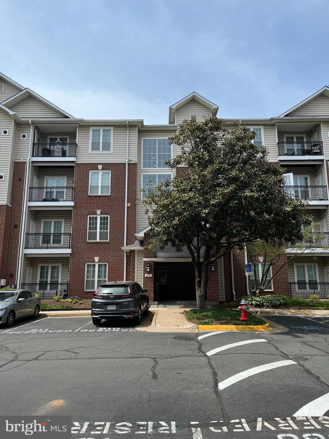 1570 Spring Gate Dr., Unit 7109 McLean, VA 22102 - Photo 2 of 21 a view of a building with a street