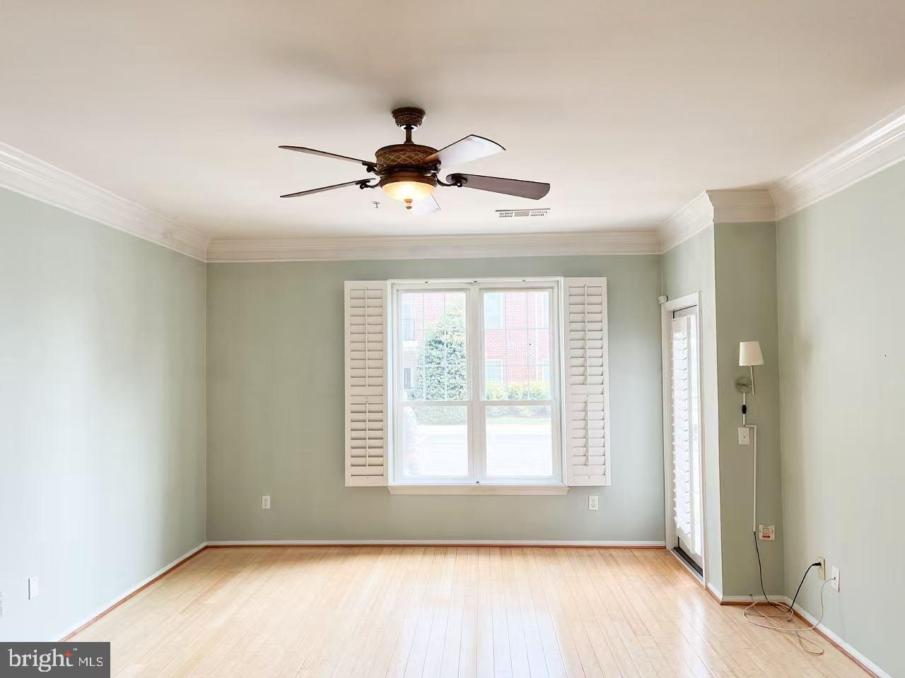 1570 Spring Gate Dr., Unit 7109 McLean, VA 22102 - Photo 9 of 21 a view of room with hardwood floor and window