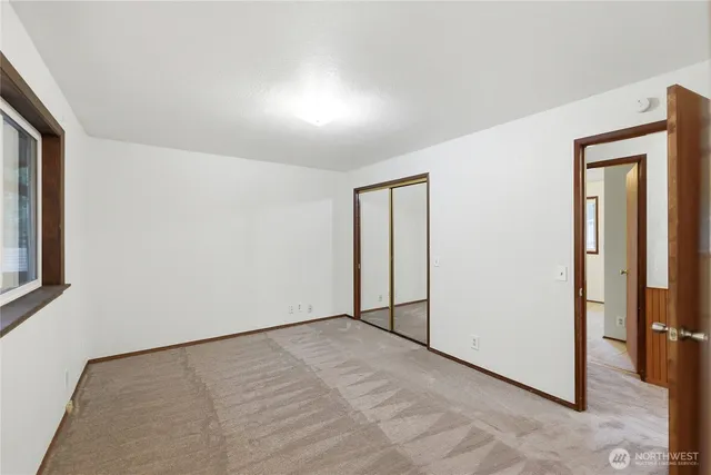 an empty room with closet