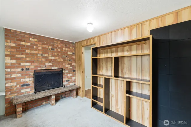 a living room with a fireplace