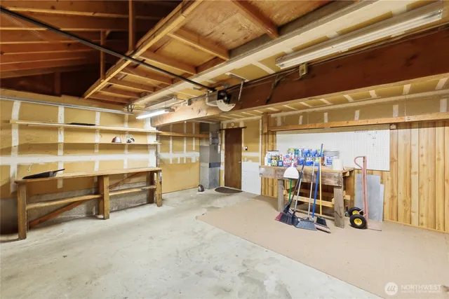 an aerial view of a house with outdoor space and street view