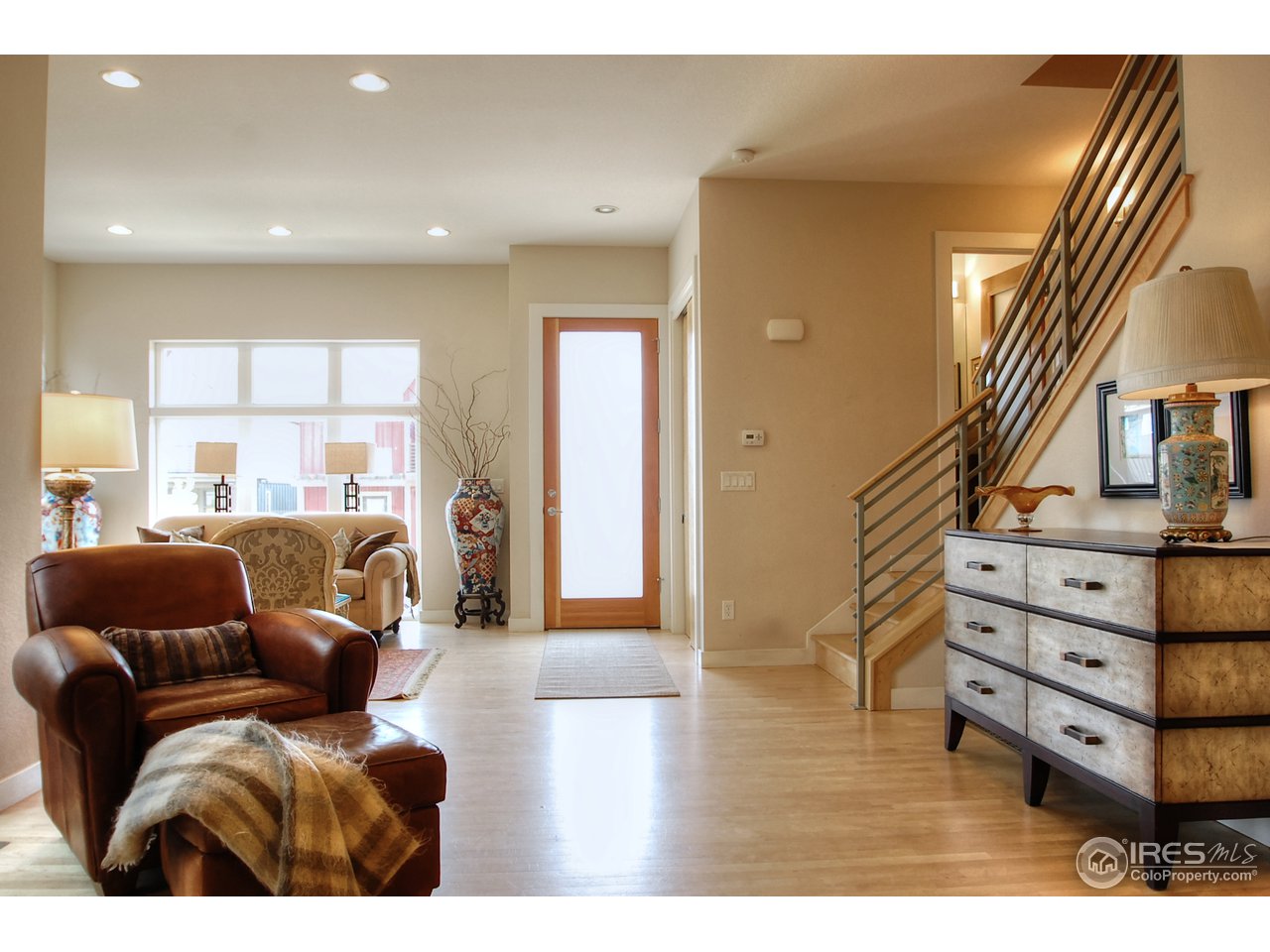 5247 5th Street Boulder, CO 80304 - Photo 6 of 22 a living room with furniture and a wooden floor