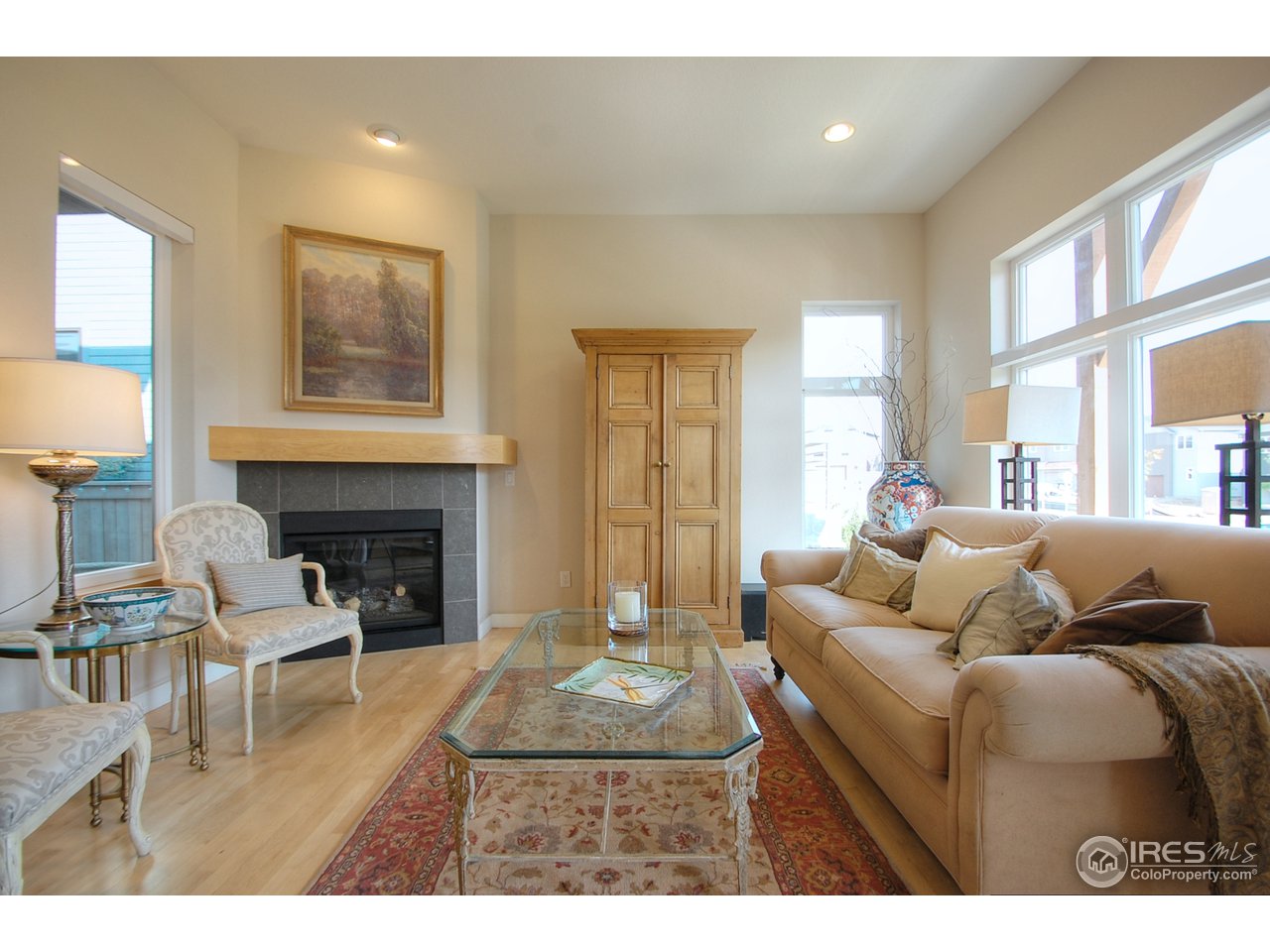 5247 5th Street Boulder, CO 80304 - Photo 7 of 22 a living room with furniture and a fireplace
