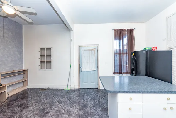 a view of kitchen and hallway