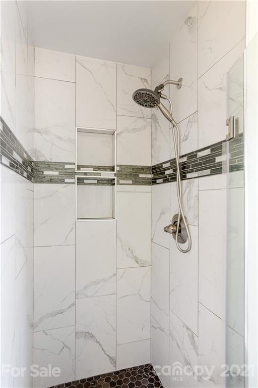312 Black River Road Fletcher, NC 28732 - Photo 20 of 29 a bathroom with a shower