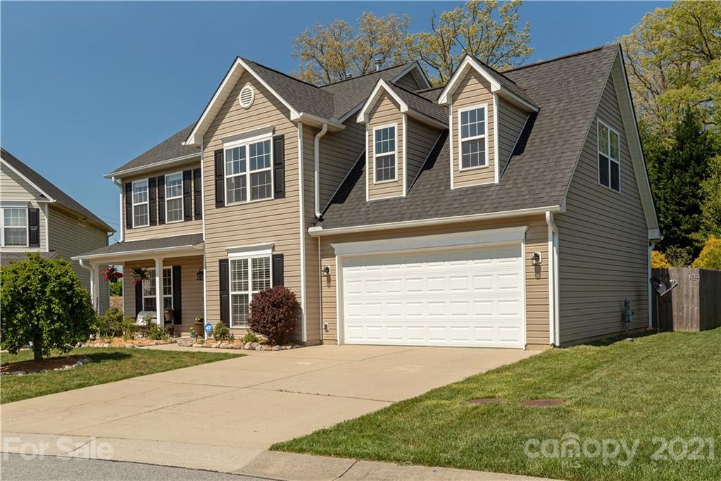 312 Black River Road Fletcher, NC 28732 - Photo 29 of 29 a front view of a house with a yard and garage