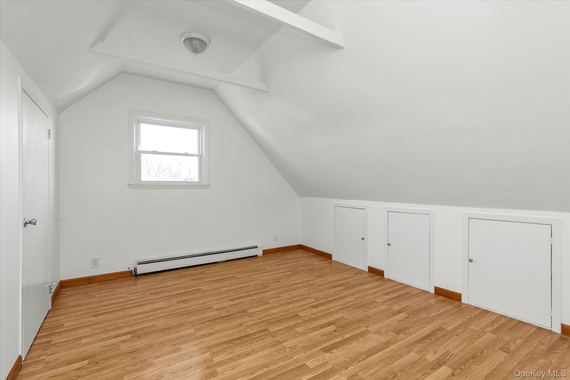 5 White Street Valley Stream, NY 11580 - Photo 12 of 23 an empty room with wooden floor