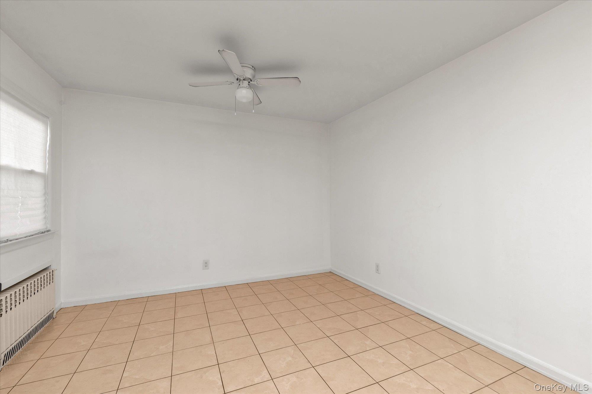 5 White Street Valley Stream, NY 11580 - Photo 8 of 23 wooden floor in an empty room