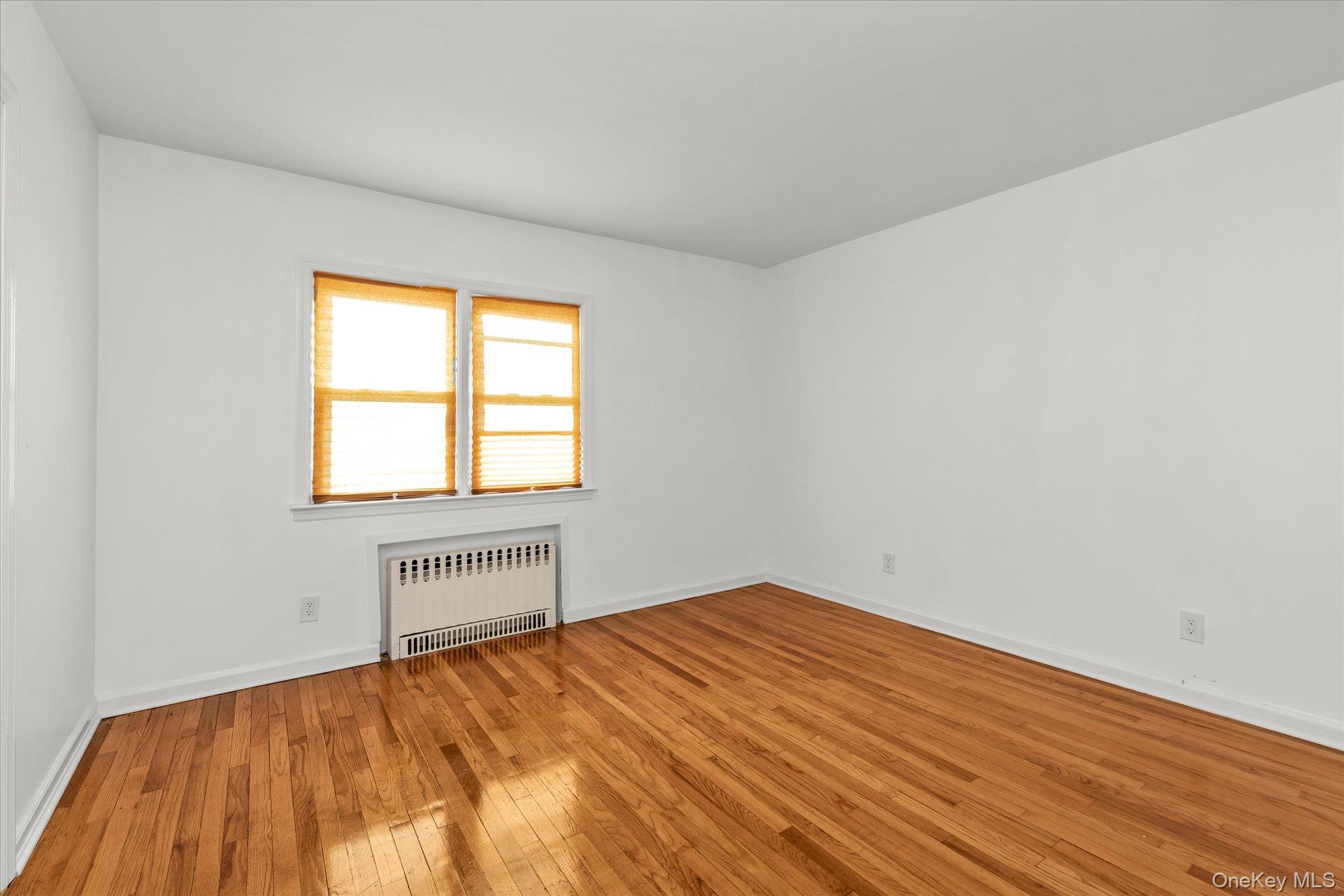 5 White Street Valley Stream, NY 11580 - Photo 10 of 23 wooden floor in an empty room