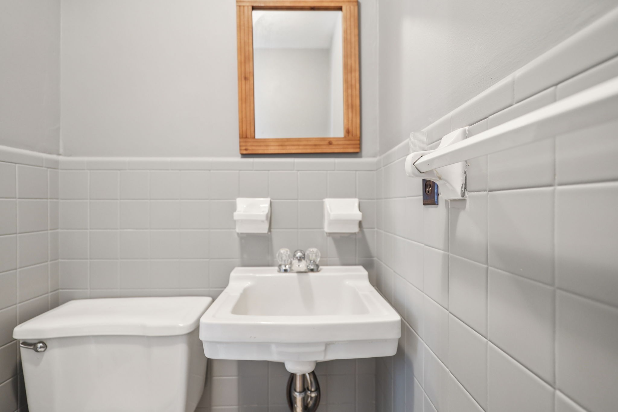 404 8th Avenue North Decherd, TN 37324 - Photo 12 of 23 a bathroom with a sink a toilet and a mirror