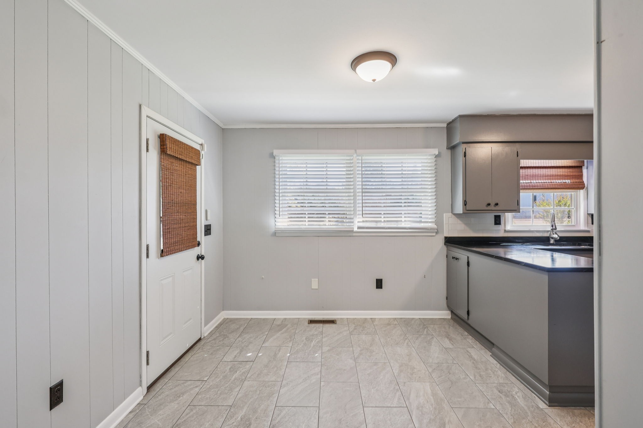 404 8th Avenue North Decherd, TN 37324 - Photo 8 of 23 a view of a kitchen with dishwasher and white cabinets