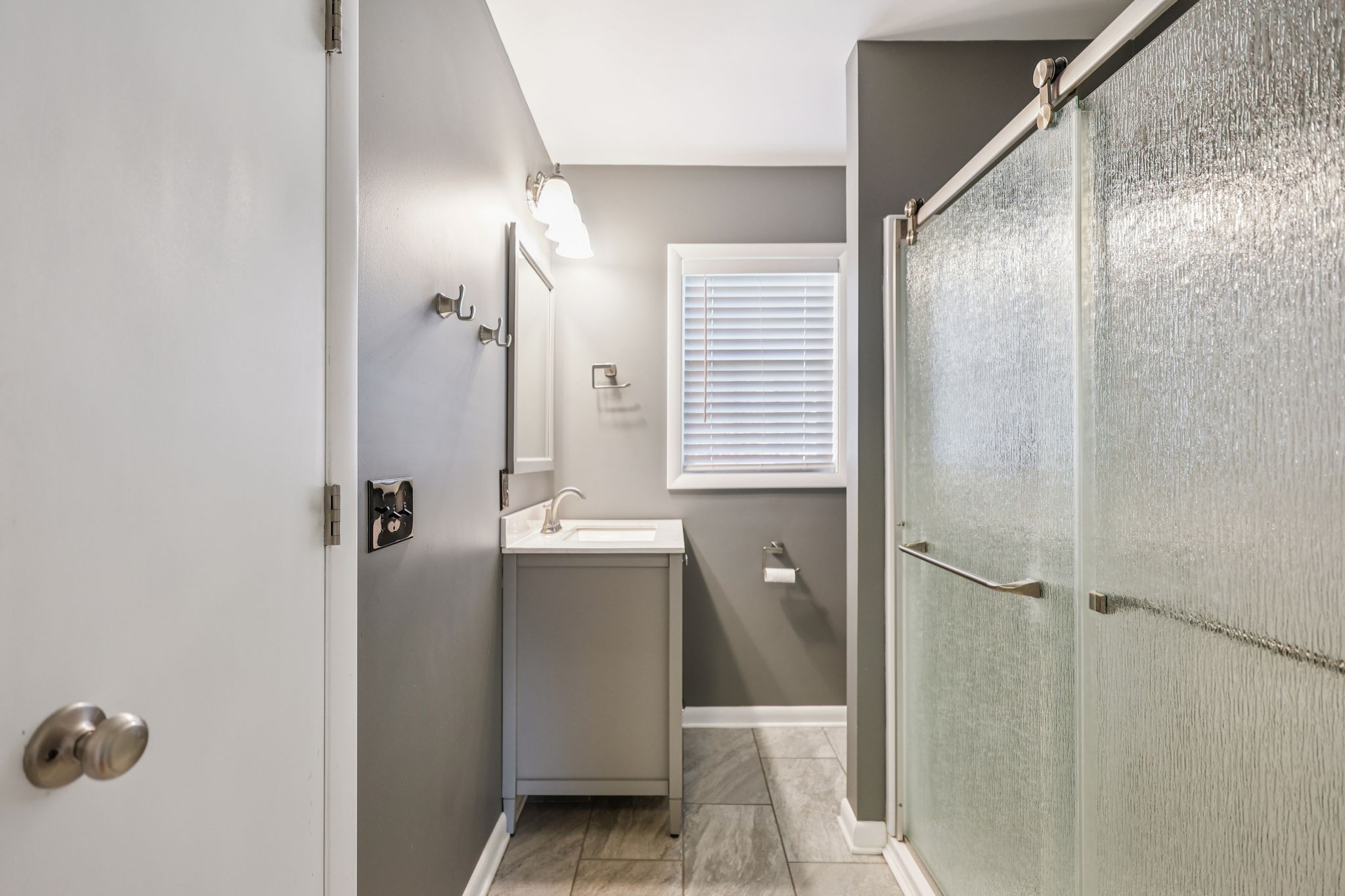 404 8th Avenue North Decherd, TN 37324 - Photo 9 of 23 a bathroom with a shower and a sink