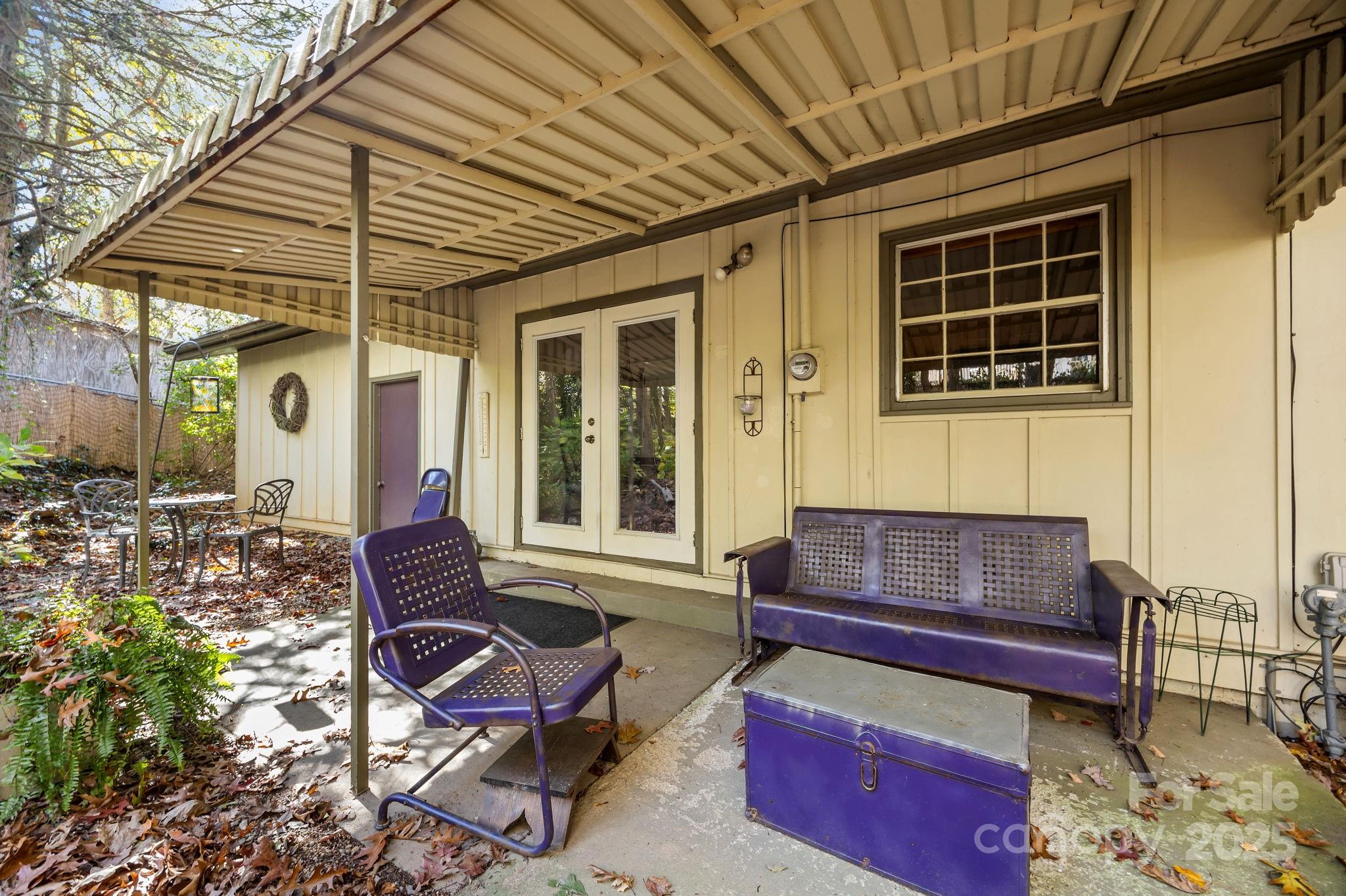 3228 Sweeten Creek Road Asheville, NC 28803 - Photo 14 of 48 a outdoor living space with furniture and a potted plant