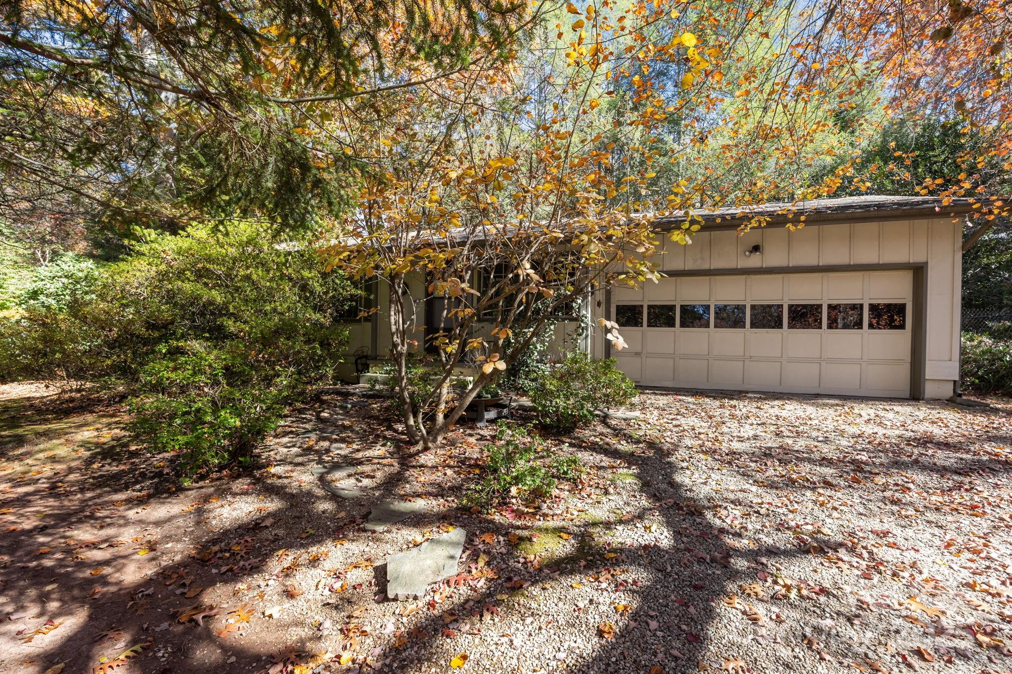 3228 Sweeten Creek Road Asheville, NC 28803 - Photo 6 of 48 a view of a house with a tree