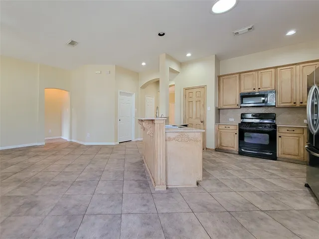 a bathroom with a sink a toilet and a bathtub