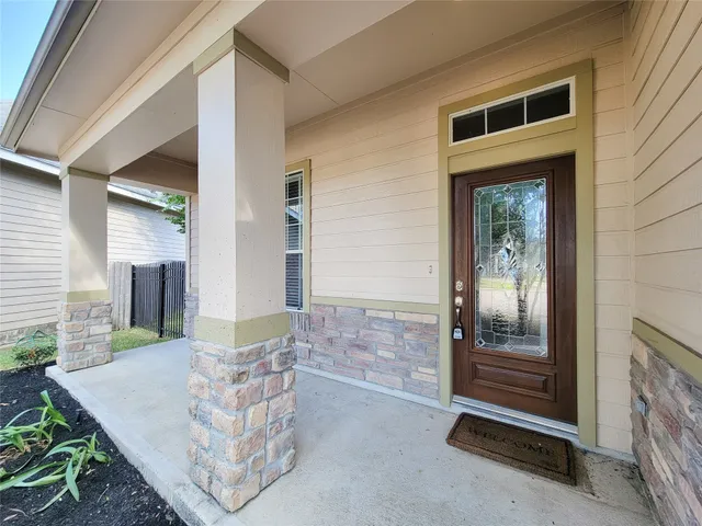 a view of a kitchen with a sink and a window