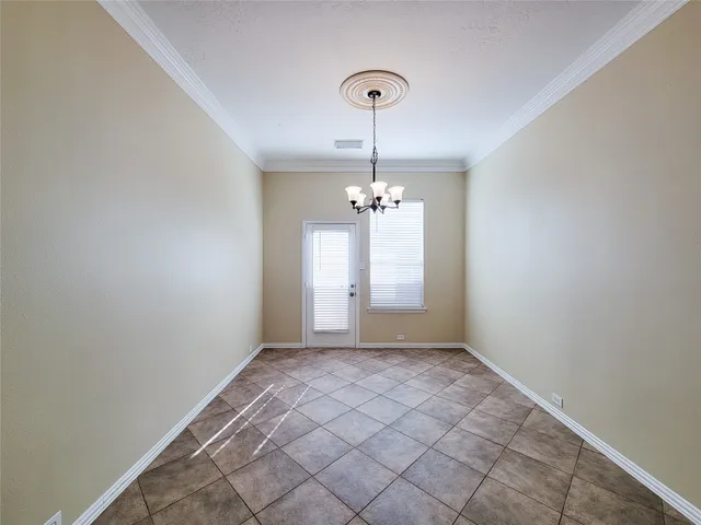 a spacious bathroom with a granite countertop sink a mirror and a