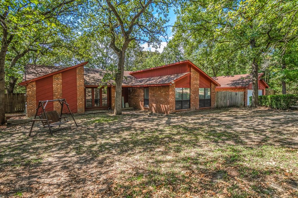 511 Long Shadow Drive Murchison, TX 75778 - Photo 1 of 1 a front view of a house with a yard