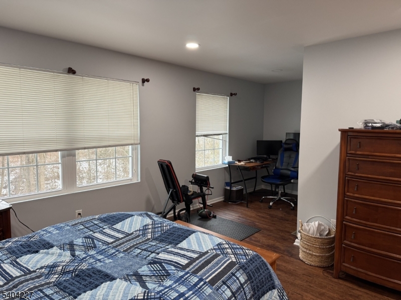 6 Paula Way Berkeley Heights, NJ 07922 - Photo 11 of 14 a bedroom with a bed and wooden floor