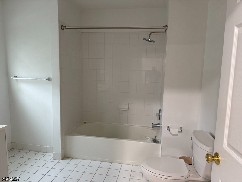 6 Paula Way Berkeley Heights, NJ 07922 - Photo 14 of 14 a bathroom with a bathtub and a shower