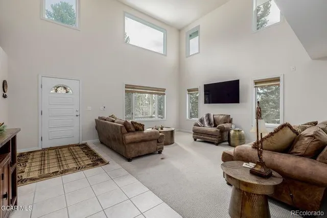 a living room with furniture and a couch