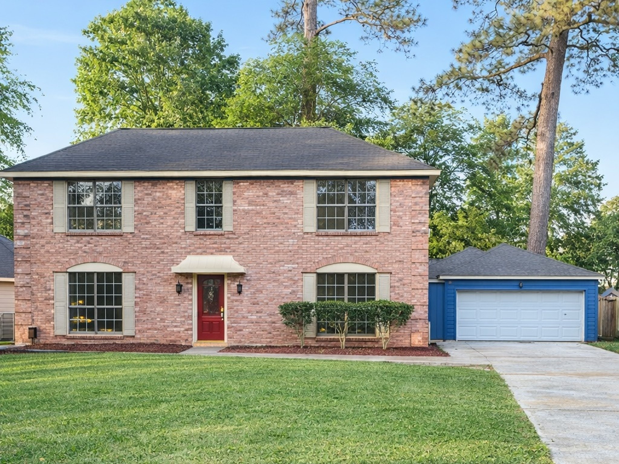 front view of a house with a yard