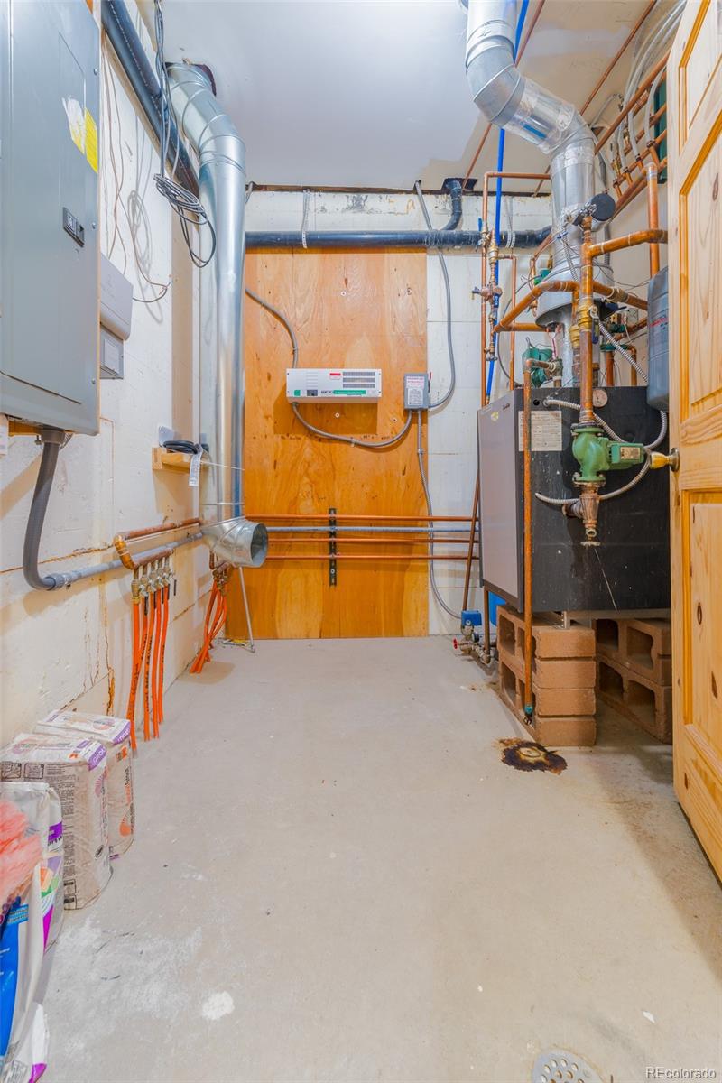 8221 Remington Road Como, CO 80432 - Photo 38 of 49 a room with gym equipment and a large window