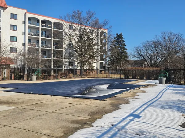 a front view of a building with street view