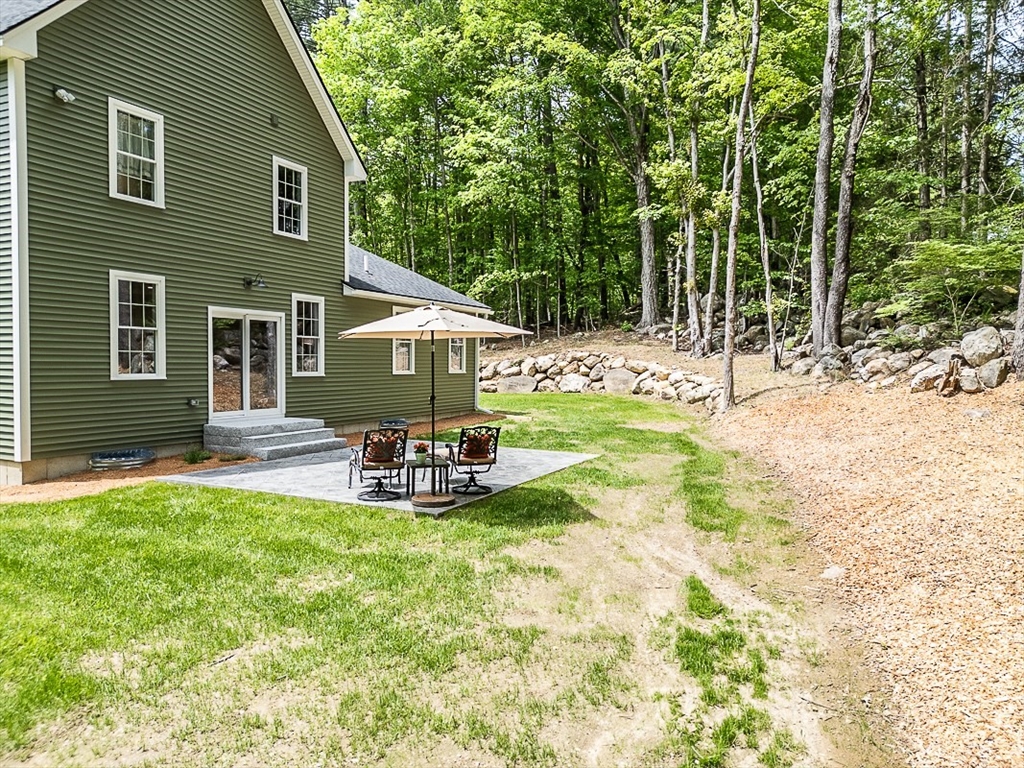 531 Clark Street Gardner, MA 01440 - Photo 34 of 42 a view of a house with backyard porch and sitting area