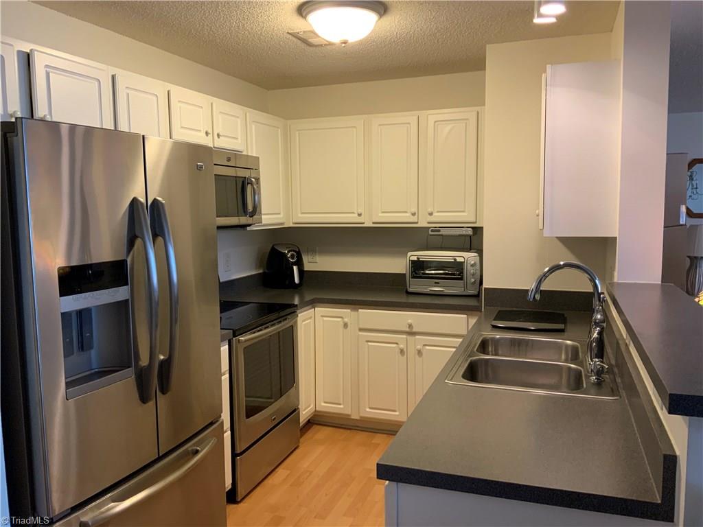 133 James Road, Unit 2C High Point, NC 27265 - Photo 6 of 14 Kitchen with stainless steel appliances