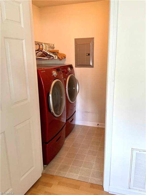 133 James Road, Unit 2C High Point, NC 27265 - Photo 9 of 14 laundry room with linen closet