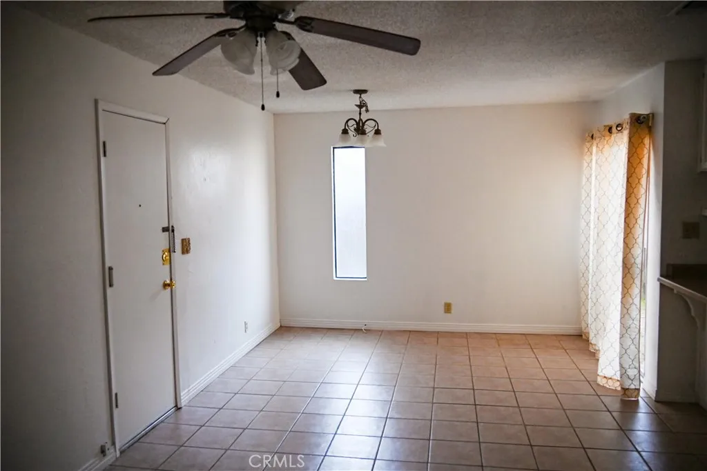 309 15th Street Paso Robles, CA 93446 - Photo 8 of 23 a view of an empty room with a window