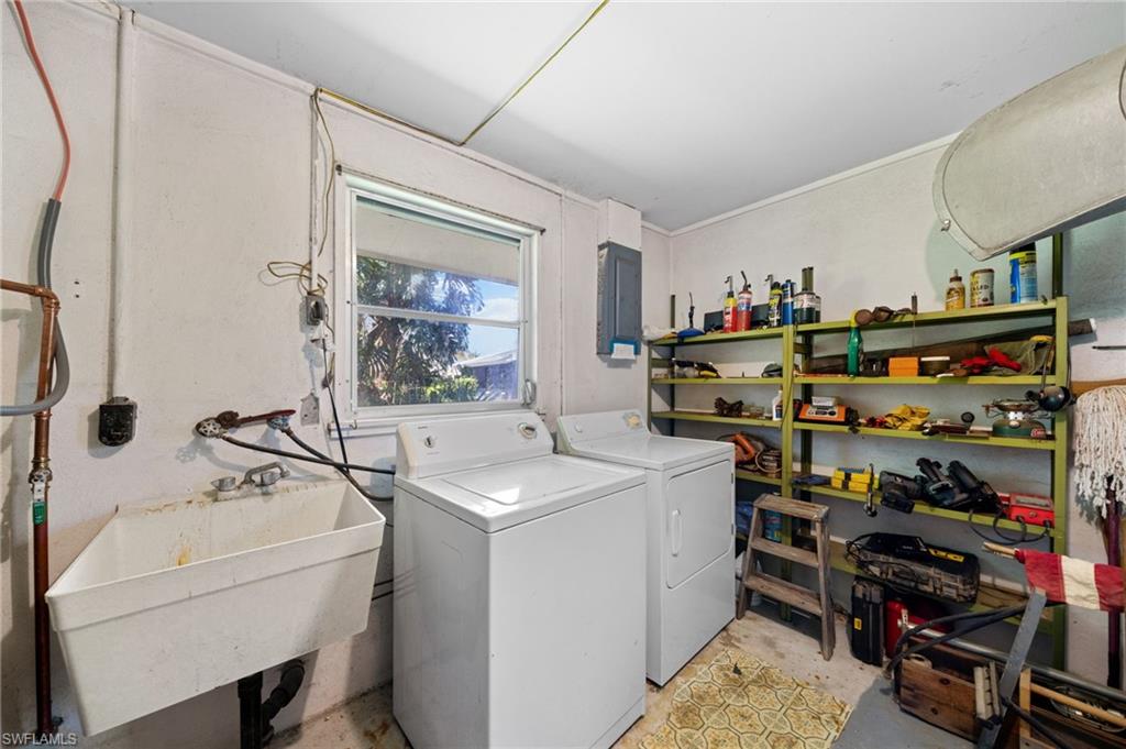 6 Maui Circle Naples, FL 34112 - Photo 21 of 22 a room with storage and utility