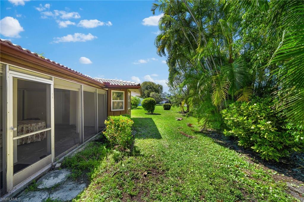 6 Maui Circle Naples, FL 34112 - Photo 22 of 22 a view of yard with green space