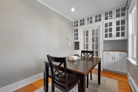 a workspace with furniture and wooden floor