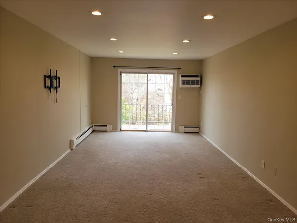 $2,675 | 100 Town House Village, Unit 805, Islandia, NY 11749