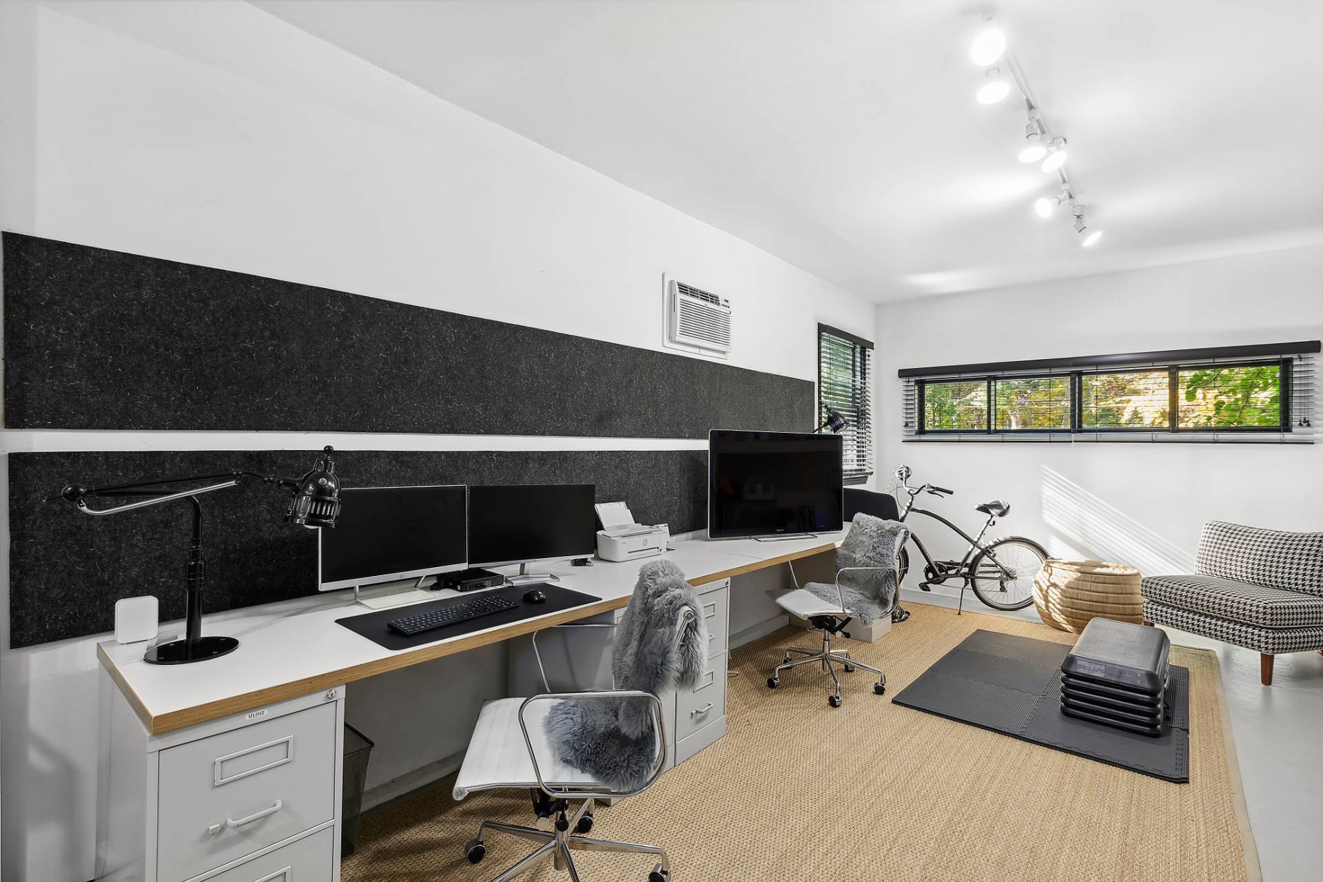 1510 Sagg Road Sag Harbor, NY 11963 - Photo 14 of 22 a view of a workspace with furniture