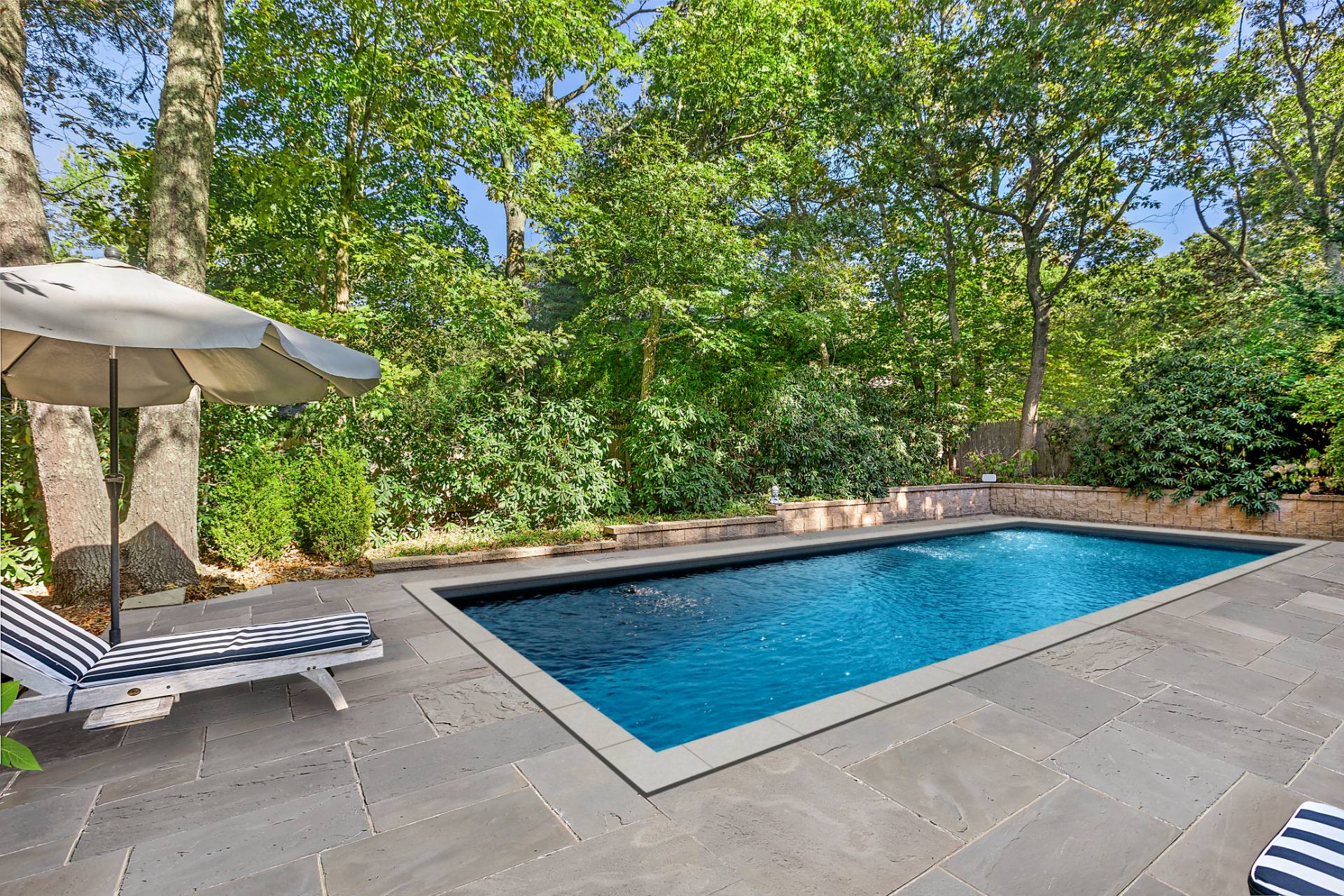 1510 Sagg Road Sag Harbor, NY 11963 - Photo 2 of 22 a view of outdoor space and swimming pool