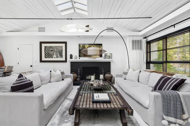 a kitchen with a table and chairs in it